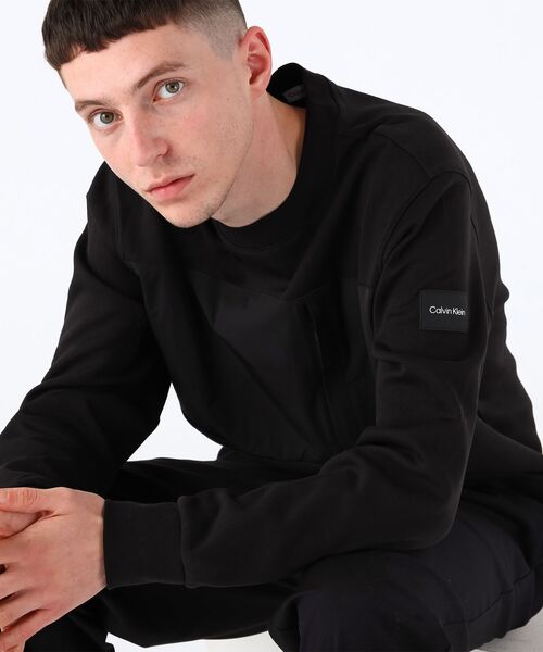 Calvin Klein(カルバン・クライン)の「リプリーブ ジップポケット トレーナー(パーカー・メンズ・ブラック/グリーン・S/M/L/XL)」の2枚目の写真