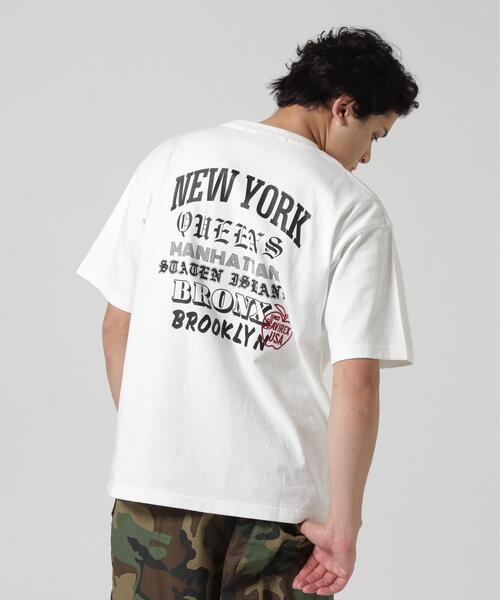 AVIREX(アヴィレックス)の「BIG APPLE T-SHIRT / ビッグアップル 半袖Tシャツ / AVIREX / アヴィレックス(Tシャツ/カットソー・メンズ・ホワイト/ブラック・MEDIUM/LARGE/X-LARGE/XX-LARGE)」の1枚目の写真