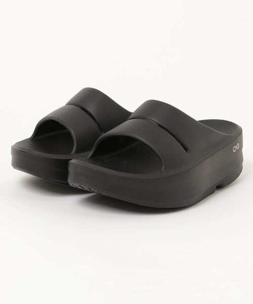 OOFOS(ウーフォス)の「ウーフォス OOFOS OOmega OOahh_Black(サンダル・レディース・ブラック・23.0cm/24.0cm/25.0cm/27.0cm/26.0cm/28.0cm)」の1枚目の写真