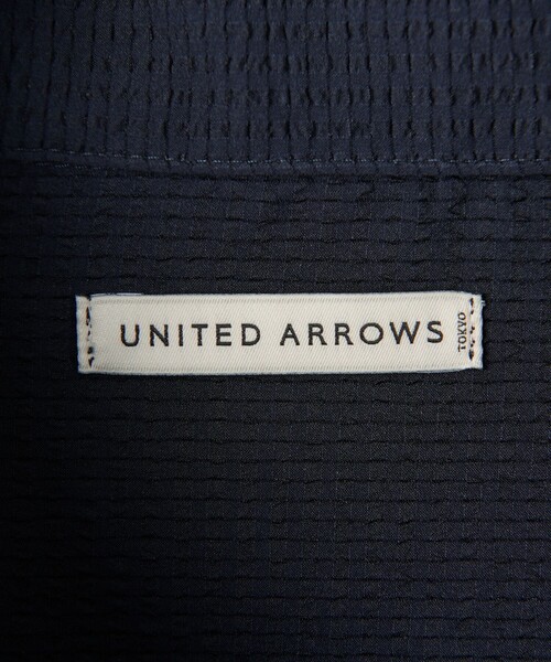 UNITED ARROWS（ユナイテッドアローズ）の「DotAir ドットエア サッカー ヘムコード プルオーバー -吸水速乾・ストレッチ-（ポロシャツ・メンズ・ブラック/ネイビー・S/L/M）」の13枚目の写真