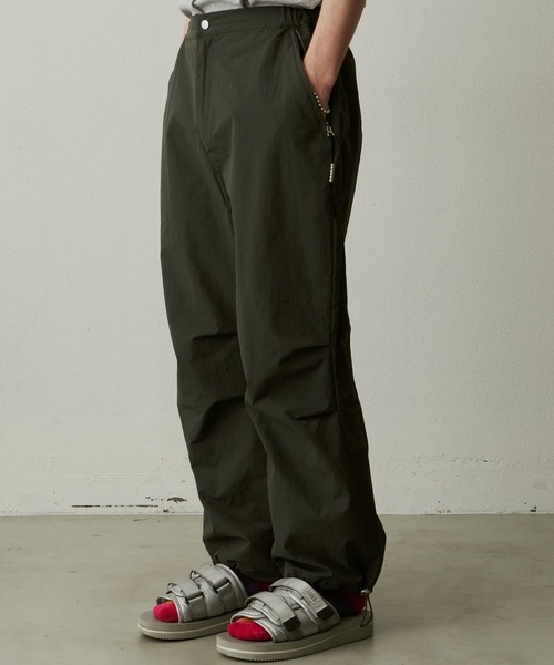UNSELDs(アンセルズ)の「UNSELDs ナイロンワイドパンツ(カーゴパンツ・メンズ・イエロー/ブラック/グリーン・MEDIUM/LARGE)」の16枚目の写真