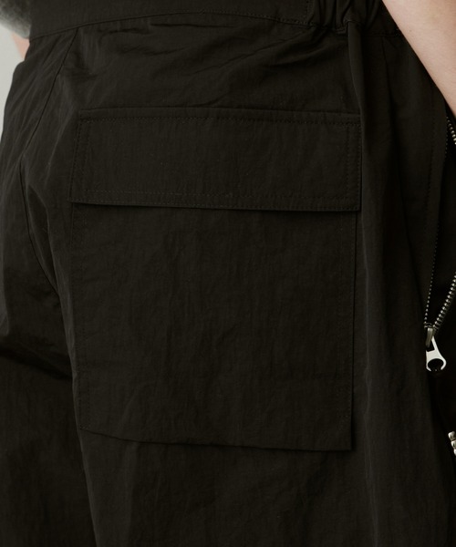 UNSELDs(アンセルズ)の「UNSELDs ナイロンワイドパンツ(カーゴパンツ・メンズ・イエロー/ブラック/グリーン・MEDIUM/LARGE)」の10枚目の写真