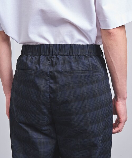 UNITED ARROWS（ユナイテッドアローズ）の「DotAir ドットエア チェック ハーフギャザー ヘムコード 2プリーツパンツ -ストレッチ-（その他パンツ・メンズ・ネイビー・L/M/S）」の11枚目の写真