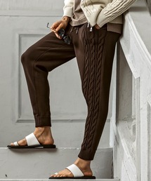 AKM（エイケイエム）の「【WEB・直営店限定】AKM Contemporary(エイケイエムコンテンポラリー)クレイジーパターン サイドケーブル ニットパンツ(伸縮性/ストレッチ性)（スウェットパンツ）」