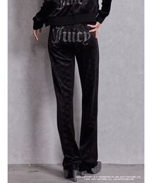 JUICY COUTURE（ジューシークチュール）の「GYDA×Juicy Couture GG JC Emboss Big Bling Velour Track Pants（スウェットパンツ）」