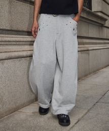 kutir（クティール）の「EYELET STUDS DESIGN SWEAT CURVE PANTS／ハトメスタッズデザインスウェットカーブパンツ（スウェットパンツ）」