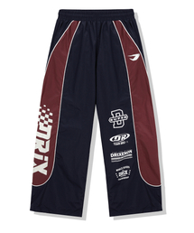DRIX（ドリックス）の「配色パイピングレーシングパンツ_ネイビー（スウェットパンツ）」