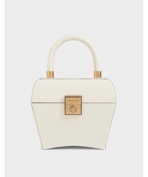 CHARLES & KEITH(チャールズ & キース)の「クロックエフェクト スカルプチャートップハンドルバッグ / Croc-Effect Sculptural Top Handle Bag(ハンドバッグ・レディース・イエロー/クリーム/ベビーピンク・M)」の2枚目の写真