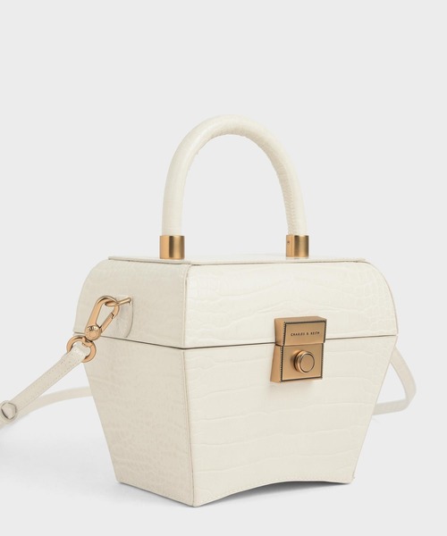 CHARLES & KEITH(チャールズ & キース)の「クロックエフェクト スカルプチャートップハンドルバッグ / Croc-Effect Sculptural Top Handle Bag(ハンドバッグ・レディース・イエロー/クリーム/ベビーピンク・M)」の4枚目の写真