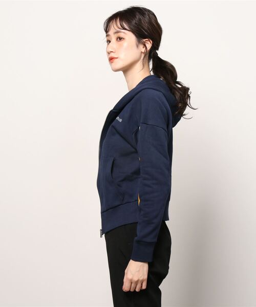 Reebok（リーボック）の「パイピング ジップアップ フーディー / Piping Zip-Up Hoodie（パーカー・レディース・ブラック/ネイビー/グレイッシュブルー・SMALL/MEDIUM/LARGE/X-LARGE/X-SMALL/XX-LARGE）」の7枚目の写真