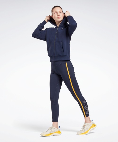 Reebok（リーボック）の「パイピング ジップアップ フーディー / Piping Zip-Up Hoodie（パーカー・レディース・ブラック/ネイビー/グレイッシュブルー・SMALL/MEDIUM/LARGE/X-LARGE/X-SMALL/XX-LARGE）」の13枚目の写真