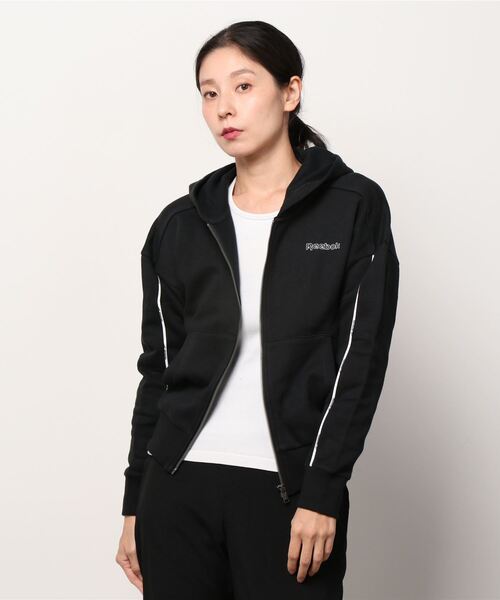 Reebok(リーボック)の「パイピング ジップアップ フーディー / Piping Zip-Up Hoodie(パーカー・レディース・ブラック/ネイビー/グレイッシュブルー・SMALL/MEDIUM/LARGE/X-LARGE/X-SMALL/XX-LARGE)」の18枚目の写真