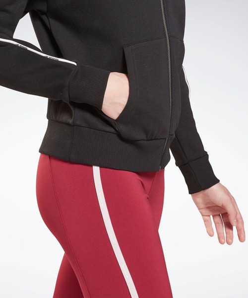 Reebok（リーボック）の「パイピング ジップアップ フーディー / Piping Zip-Up Hoodie（パーカー・レディース・ブラック/ネイビー/グレイッシュブルー・SMALL/MEDIUM/LARGE/X-LARGE/X-SMALL/XX-LARGE）」の4枚目の写真