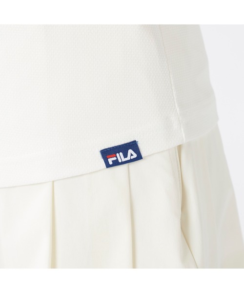 FILA GOLF(フィラゴルフ )の「FILA GOLF/フィラ ゴルフ ゴルフウェア ブランド ロゴ カットアウト ジャガード ハイネック 半袖 シャツ UVカット(Tシャツ/カットソー・レディース・ブルー/ブラック/ホワイト・M/L/LL)」の13枚目の写真