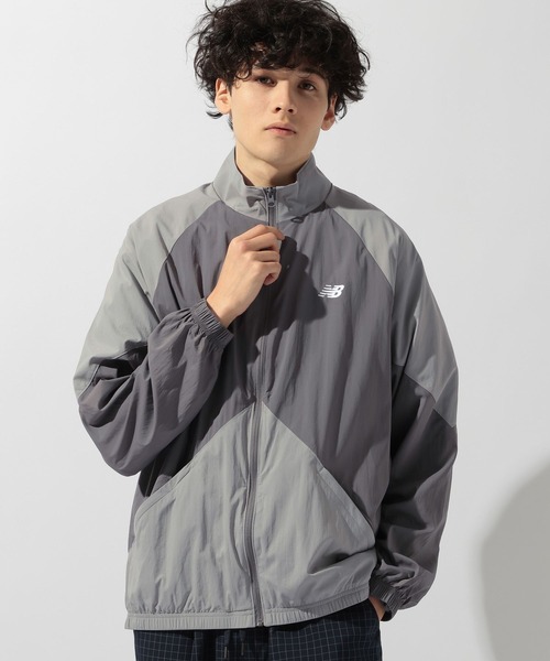 NEW BALANCE(ニューバランス)の「【New Balance(ニューバランス)】スポーツレガシージャケット(ナイロンジャケット・メンズ・ネイビー/グレー・LARGE)」の2枚目の写真