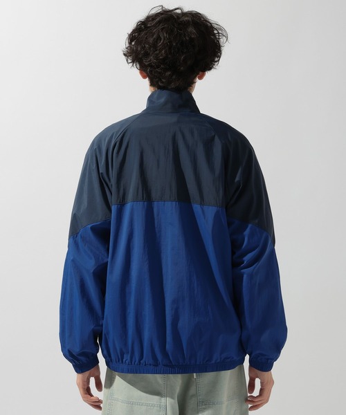 NEW BALANCE(ニューバランス)の「【New Balance(ニューバランス)】スポーツレガシージャケット(ナイロンジャケット・メンズ・ネイビー/グレー・LARGE)」の18枚目の写真