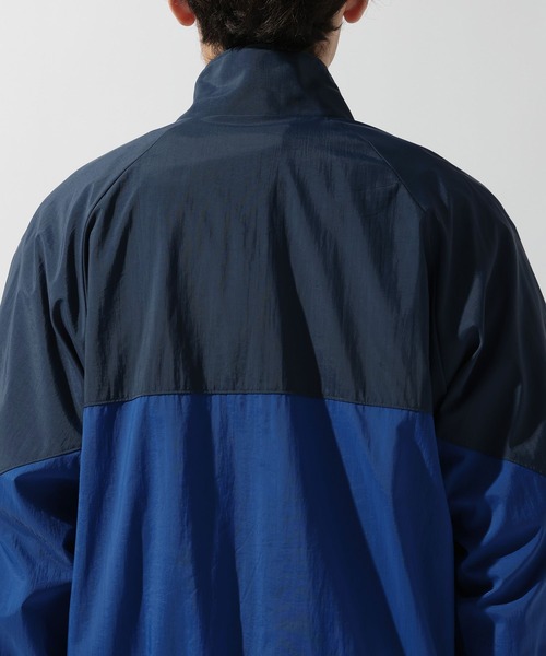 NEW BALANCE(ニューバランス)の「【New Balance(ニューバランス)】スポーツレガシージャケット(ナイロンジャケット・メンズ・ネイビー/グレー・LARGE)」の3枚目の写真