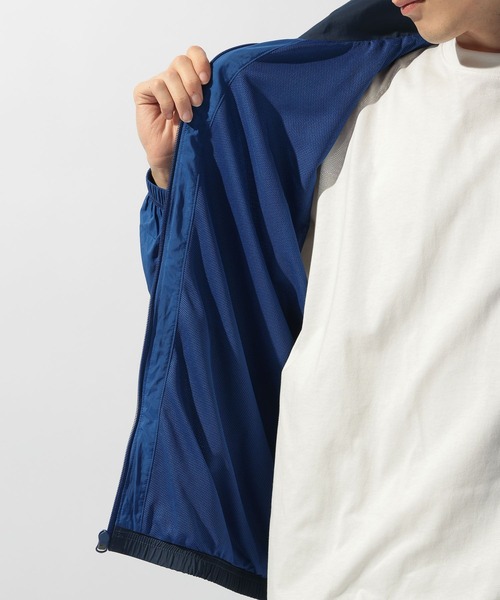 NEW BALANCE(ニューバランス)の「【New Balance(ニューバランス)】スポーツレガシージャケット(ナイロンジャケット・メンズ・ネイビー/グレー・LARGE)」の7枚目の写真