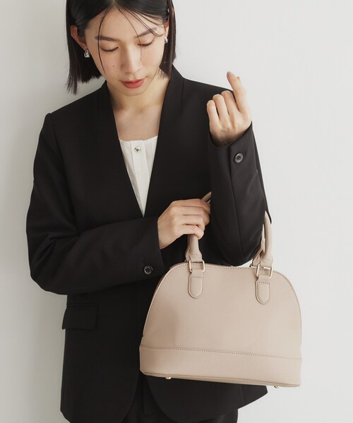 THE SHOP TK （ザ ショップ ティーケー ）の「ラウンド型オケージョンBAG（ショルダーバッグ・レディース・ブラック/ベージュ・00）」の2枚目の写真