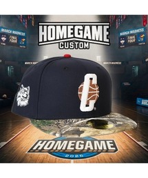 NEW ERA（ニューエラ）の「ニューエラ【NEW ERA】- ユーコン ハスキーズ キャップ【UConn Huskies Jonathan the Husky 59FIFTY Navy/Real Tree Camo】（キャップ）」