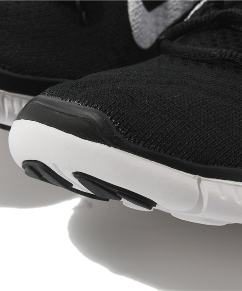 NIKE(ナイキ)の「ランニング ウィメンズ ナイキ フリー フライニット WMNS NIKE FREE FLYKNIT(スニーカー・レディース・ブラック/イエロー・23cm/23.5cm/24cm/24.5cm)」の7枚目の写真