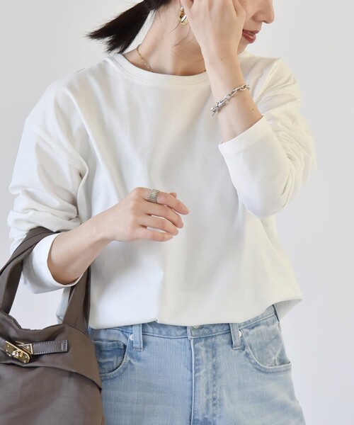 quaranciel(カランシエル)の「quaranciel:〈洗濯機可能〉ラウンドヘム ロングスリーブ コンパクト Tシャツ(Tシャツ/カットソー・レディース・チャコールグレー/ホワイト/オフホワイト/ブラック・ONE SIZE)」の1枚目の写真