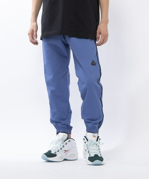 Reebok(リーボック)の「クラシック ATR パンツ / ATR HOOPWEAR PANT(スウェットパンツ・メンズ・ブルー/ブラック・LARGE/MEDIUM/SMALL/XX-LARGE/X-LARGE)」の1枚目の写真