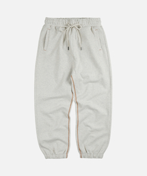 FRIZMWORKS（フリズムワークス）の「COVER STITCH SWEAT PANTS _ OATMEAL（スウェットパンツ）」