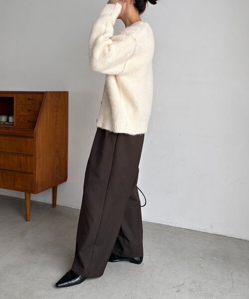 カプリシュレマージュ ニュアンスボタンレイヤード風カーディガン