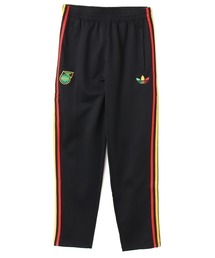 adidas（アディダス）の「adidas JAMAICA X BOB MARLEY ORIGINALS TRACK PANTS / アディダス ジャマイカ × ボブマーリー オリジナルス トラックパンツ（その他パンツ）」