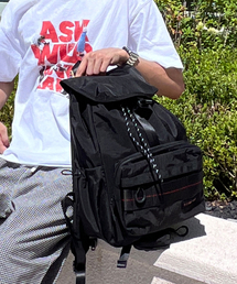 BSMT（ベースメントアーカイブ）の「[BSMT x STORAGE] ボイジャーストリングバックルバックパック（バックパック/リュック）」