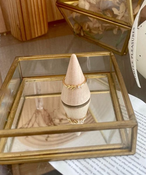 crafty（クラフティー）の「金属アレルギー対応/アルファベットジルコニアリング/サージカルステンレス（リング・レディース・ゴールド系その他/ピンク系その他3/ゴールド系その他2/ゴールド系その他3/ゴールド系その他4/ピンク系その他/シルバー系その他3/ゴールド系その他5/シルバー系その他4/シルバー系その他2/シルバー系その他5/ピンク系その他2/ピンク系その他4/ピンク系その他5/シルバー系その他・FREE）」の21枚目の写真