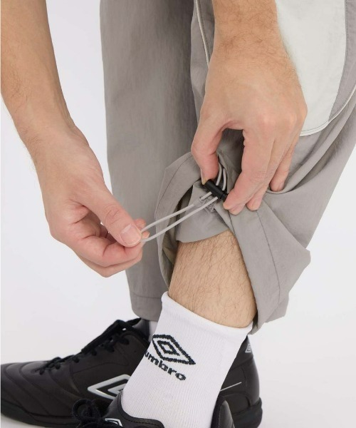 UMBRO（アンブロ）の「umbro/アンブロ ナイロンウーブンワイドパンツ ウインド・シェル（その他パンツ・メンズ・オフホワイト/ネイビー・S/L/O/M）」の14枚目の写真