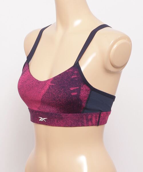Reebok(リーボック)の「Lux ストラッピー スポーツブラ / Lux Strappy Sports Bra(スポーツブラ・レディース・マジェンタ/ブラック・SMALL/MEDIUM/LARGE/X-LARGE/XX-LARGE/X-SMALL)」の4枚目の写真