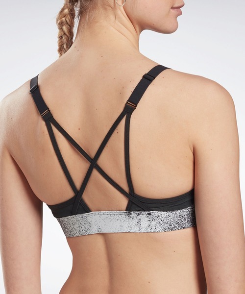 Reebok(リーボック)の「Lux ストラッピー スポーツブラ / Lux Strappy Sports Bra(スポーツブラ・レディース・マジェンタ/ブラック・SMALL/MEDIUM/LARGE/X-LARGE/XX-LARGE/X-SMALL)」の13枚目の写真