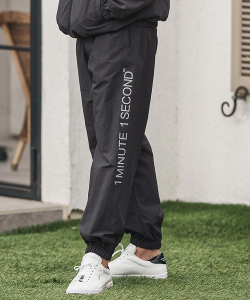1minute 1second（ワンミニットワンセカンド）の「mp13847-cotton like nylon training pants with logo print ナイロンパンツ（その他パンツ・メンズ・ブラック/ネイビー/チャコール・S/M/L/XL）」の6枚目の写真