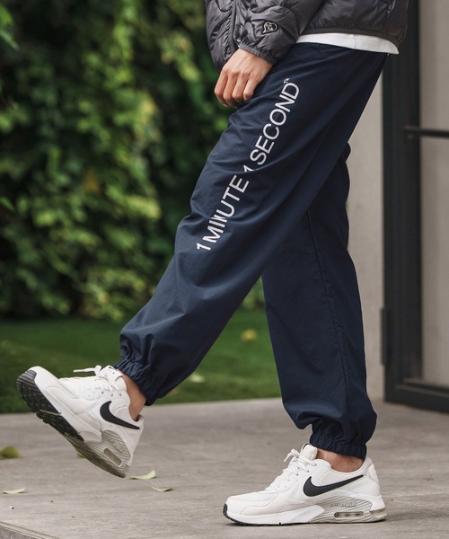 1minute 1second（ワンミニットワンセカンド）の「mp13847-cotton like nylon training pants with logo print ナイロンパンツ（その他パンツ・メンズ・ブラック/ネイビー/チャコール・S/M/L/XL）」の11枚目の写真