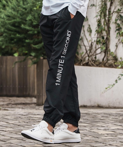 1minute 1second（ワンミニットワンセカンド）の「mp13847-cotton like nylon training pants with logo print ナイロンパンツ（その他パンツ・メンズ・ブラック/ネイビー/チャコール・S/M/L/XL）」の15枚目の写真