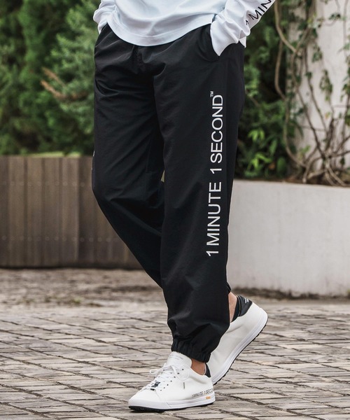 1minute 1second（ワンミニットワンセカンド）の「mp13847-cotton like nylon training pants with logo print ナイロンパンツ（その他パンツ・メンズ・ブラック/ネイビー/チャコール・S/M/L/XL）」の16枚目の写真