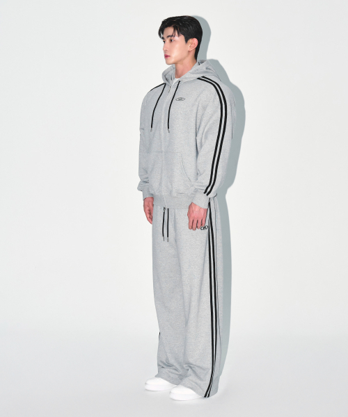 BORN TO WIN（ボーントゥウィン）の「CHROME B TRACK LINE SEMI WIDE PANTS [MELANGE GREY]（スウェットパンツ・メンズ・その他・1/2/3）」の4枚目の写真