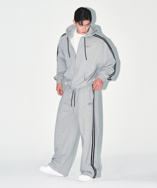 BORN TO WIN（ボーントゥウィン）の「CHROME B TRACK LINE SEMI WIDE PANTS [MELANGE GREY]（スウェットパンツ・メンズ・その他・1/2/3）」の6枚目の写真