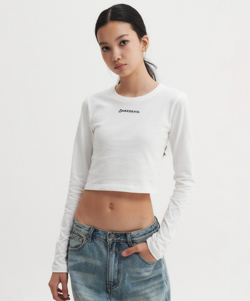 DNSR WOMEN(ディーエヌエスアールウーマン)の「デアデビル クロップ ロングスリーブ ホワイト(Tシャツ/カットソー・レディース・その他・SMALL/MEDIUM)」の1枚目の写真