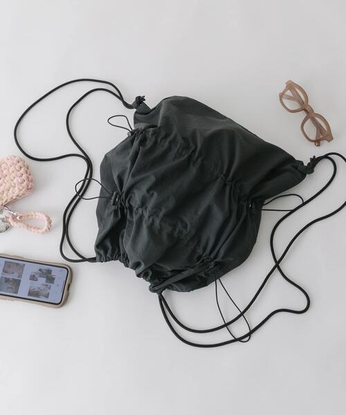 SMELLY（スメリー）の「ドロストギャザーナップサック（バックパック/リュック・レディース・ブラック/ライトブルー・-）」の2枚目の写真