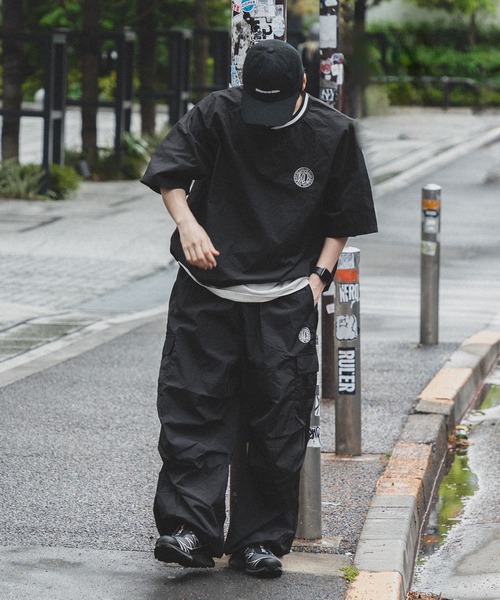 kutir（クティール）の「サークルロゴナイロン半袖プルオーバー（その他トップス・メンズ・ネイビー/ブラック・MEDIUM/LARGE）」の19枚目の写真