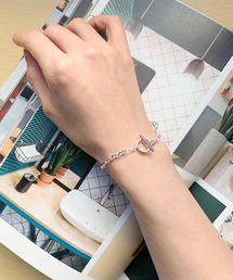 BUTTON＆CUFFLINKS（ボタンアンドカフリンクス）の「BUTTON＆CUFFLINKS　ボタンアンドカフリンクス：チェーンイヤーカフブレスレット（ブレスレット）」