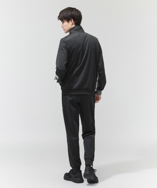PUMA(プーマ)の「【別注】プーマ PUMA ESS ブロック ポリ スーツ 限定コラボ(ジャージ・メンズ・ブラック/ネイビー・S/M/L/LL/3L)」の3枚目の写真