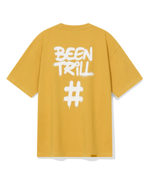 BEENTRILL（ビントリル）の「スプレーハッシュタグオーバーサイズ半袖Tシャツ（マスタード）（Tシャツ/カットソー）」