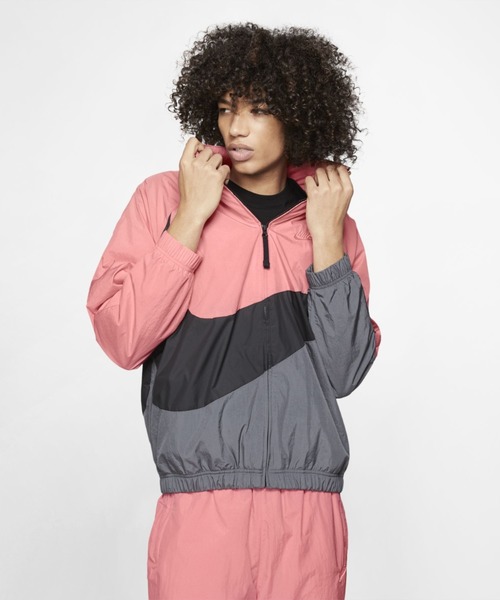 NIKE(ナイキ)の「ナイキ スポーツウェア ウーブン ジャケット《セットアップ対応商品》(ブルゾン)」|ピンク