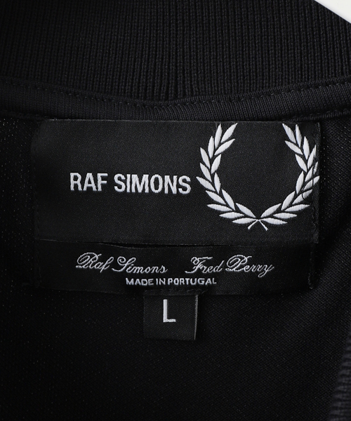 FRED PERRY×RAF SIMONS(フレッドペリーラフシモンズ)の「【RAFSIMONS × FREDPERRY】PATCHED ポロシャツ(ポロシャツ・メンズ・ブラック・SMALL/MEDIUM/LARGE)」の11枚目の写真