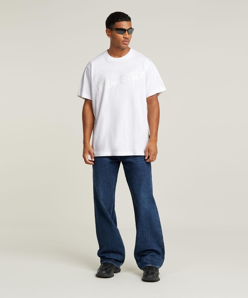 G-STAR（ジースター）の「FLOCK G-SCRIPT LOOSE T-SHIRT/フロックプリントロゴオーバーサイズTシャツ（Tシャツ/カットソー・メンズ・ダークブラック/ホワイト・X-SMALL/SMALL/MEDIUM/LARGE/X-LARGE）」の4枚目の写真